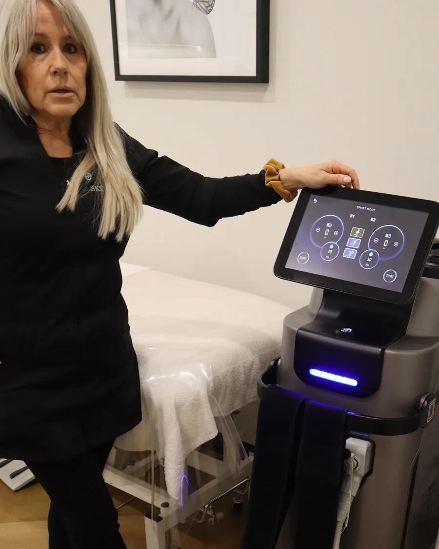 Carmel with the body toning equipment at Skin Affair
